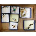 7 x Adrian Buckley costume jewellery brooches: In original boxes