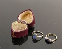 Three gold gem set rings 9ct & 18ct: Includes 18ct diamond & sapphire ring size M, 9ct garnet ring