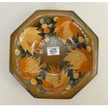 William Moorcroft octagonal footed bowl:, decorated with the leaf & berries design in unusual