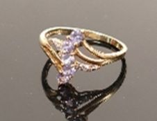 9ct gold ladies dress ring set light purple & white stones: Size R, weight 1.9g.