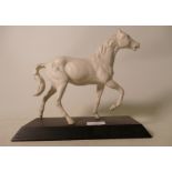 Beswick white matte Spirit horse :on black wood plinth.