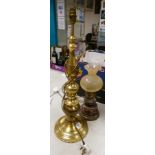 A large brass lampbase: together with a wooden lampbase with shade. Height of tallest 68cm