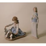 Lladro Figures: 5688 Dogs Best Friend & Girl with Flowers 4650, both with v minor petal damage(2)