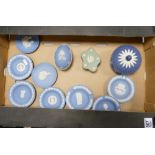 A mixed collection of Wedgwood Jasperware items to include: lidded boxes, pin trays Queens Blue