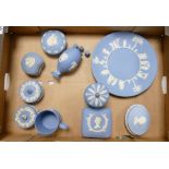 A mixed collection of Wedgwood Jasperware items to include: lidded boxes, pin trays, plates, mugs
