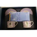 A collection of boxed Wedgwood cups and saucers from the 19th, 20th and 21st Millenium Collection(3)