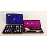 Cased silver 6 x coffee spoons & tongs plus spoon & fork: Gross weight 102 grams.
