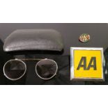 Vintage AA badge and pair of sunglasses: