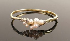 9ct gold bangle set cultured pearls and white stones: Gross weight 9.1g