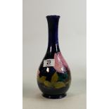 Moorcroft pink magnolia on blue vase: Height 27cm