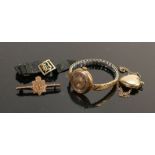 Group of 9ct gold items: Includes brooch with brass pin, 9ct bk & ft locket with gold coloured