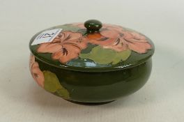 Moorcroft Hibiscus on green lidded pot: 13.5cm diameter