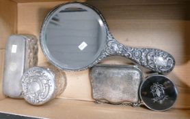 Five items of silver: Includes Mirror (at fault), 2 x silver topped jars, purse (appears silver