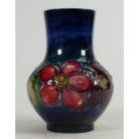 Moorcroft Anemone on fading blue ground vase: Height 12cm.