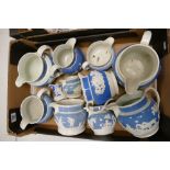 A collection of 19th Century Blue & White Embossed Jugs: with Floral & Classical patterned items