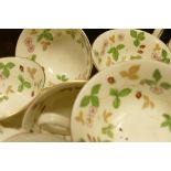 A collection of Wedgwood tea ware to include: Hathaway Rose pattered tea & coffee pots, Wild