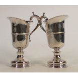 Pair of silver ewers: Hallmarked for London 1972, 491g. (2)