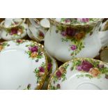 A collection of Royal Albert Old Country Roses patterned tea & dinner ware: 25 pieces.