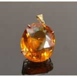 Large topaz of good colour set in 9ct gold pendant: Stone measures 31mm x 26mm x 13mm appx. A very