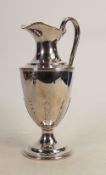 Silver claret jug: Hallmarked for London 1975, height 27cm, 937g.