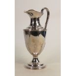 Silver claret jug: Hallmarked for London 1975, height 27cm, 937g.