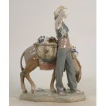 Lladro large figure group "Pedler": Man standing next to donkey, selling pottery, height 26cm.