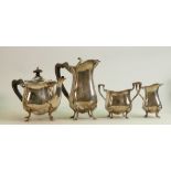 Silver four piece tea set: Hallmarked for Birmingham 1919, (overall weight 1106g including wooden