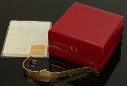 Ladies 9ct gold Omega De Ville wristwatch: With 9ct gold Omega bracelet, original guarantee dated