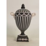 Wedgwood black dip engine turned handled urn: 1954, height 21cm.