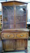 Regency Mahogany Secretaire bookcase with Satinwood fitted drawers interior: Circa 1810-20, one