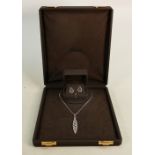 18ct white gold diamond pendant, chain & earrings set: The pendant and earrings set with black