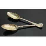 A pair of silver gilt spoons: Hallmarked for London 1756, makers Richard Pargeter, 115g. (2)