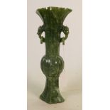 Chinese spinach Jade two handled vase: The handles in the form of dragons heads, height 26cm.