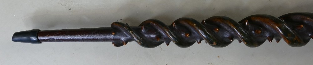 A good 20th century carved twisted wood walking stick: Carved with two serpents, spikes, - Image 4 of 8