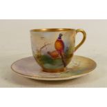 Royal Worcester hand painted cup & saucer: Signed R Austin, decorated with pheasants & foliage.
