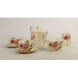 Wileman & Co decorative tea set for two: Gilded embossed floral decoration. Small firing crack to