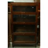 Four door Globe Wernicke Universal Elastic bookcase: Height 160cm, width 87cm and depth 29cm.