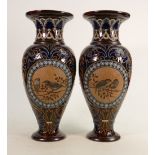 An excellent pair of Doulton Lambeth vases: By Florence Barlow, decorated front and back with panels