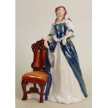 Royal Doulton prototype figure of a maid: With feather, standing next to a chair, height 23.5cm.