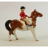 Beswick girl with red jacket on Skewbald pony 1499: With red jacket painted off the factory.