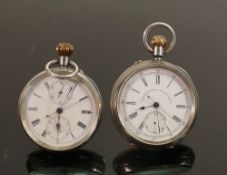 Two large & heavy silver center seconds chronograph pocket watches: T R Russell's keyless lever
