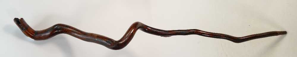 Interesting vintage twisted carved walking stick: Carved with snakes head handle and mask head and