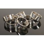 A set of six silver napkin rings: Hallmarked for Birmingham 1988, 325g. (6)