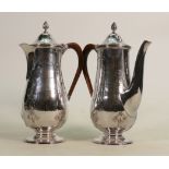 Silver chocolate & coffee pot: Hallmarked for London 2005, wooden handles to both pots, 937g. (2)