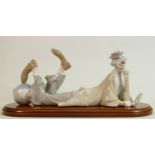 Lladro large figure of a recumbent clown with a ball: Model 4618 on plinth.