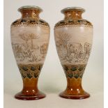 A Pair of Doulton Lambeth vases: Decorated with donkeys, cattle and farmhouse by Hannah Barlow and