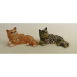 Beswick lying Persian cat 1876 in black and grey Swiss roll colours together with a ginger cat (2):