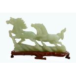 Modern Chinese carved stone figure of horses: On wooden plinth, length 23cm, boxed.