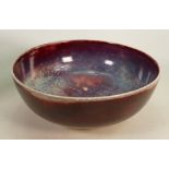 Ruskin high fired footed bowl with blue and green colours, diameter 25cm: