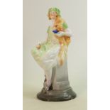 Shelley Art Deco figure of seated lady with teacup: In orange and light green colourway, height
